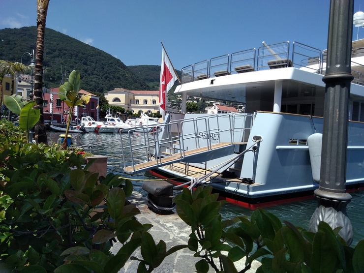 Gangway in carbon fiber with teak, led and special rigid quick-release stanchions on a motor yacht Finish like the yacht - Swivel vertically and horizontally with 3 stages